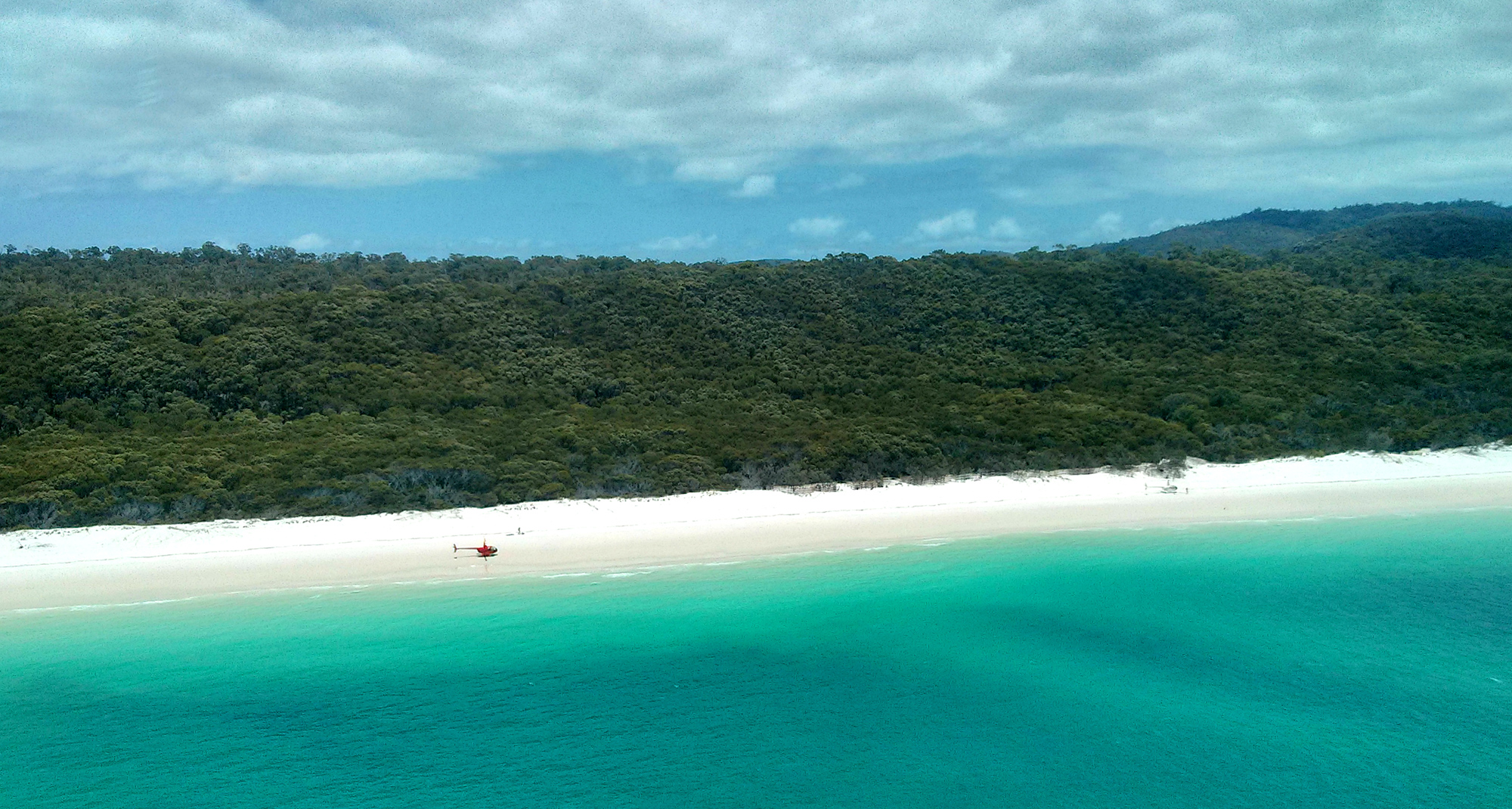 Take a helicopter tour of Whitehaven Beach - Hamilton Island romantic getaways